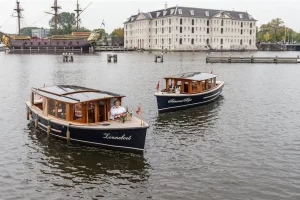 Admiraal Heijn together with De Zonneboot in front of Maritime Museum