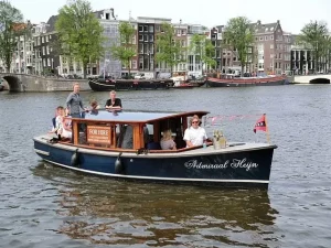 Admiral Heijn sailing along the canals of Amsterdam