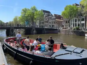 Group having drinks on boat Amigo Amsterdam