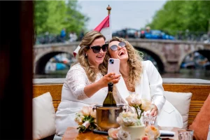 Wedding ceremony on a solar-powered boat on the canals of Amsterdam