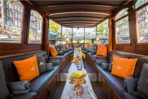 Interior with Dutch snacks on table MS Agatha boat