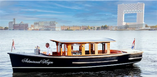Saloon boat Admiraal Heijn sailing on the IJ in Amsterdam