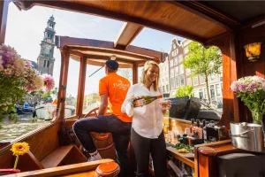 Skipper and hostess on saloon boat MS Agatha