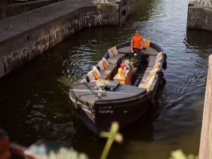 Sloop Vording sailing with skipper on canals